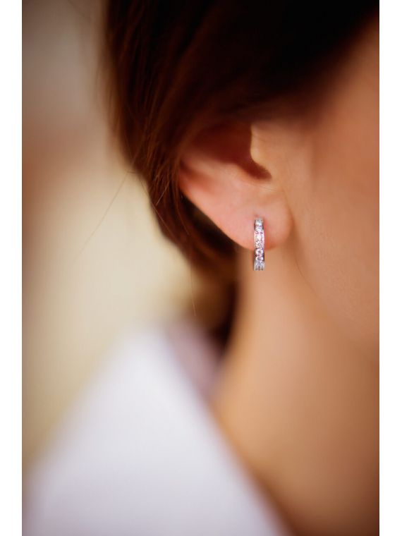 14K Gold hoop earrings with diamonds.