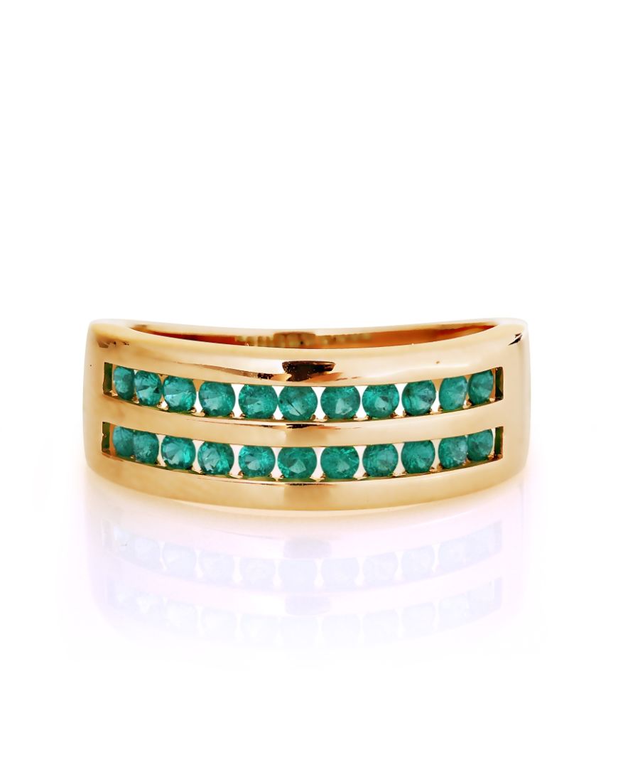 Rose gold ring with emeralds